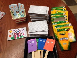 Mini-murals, markers, story time props, and Día bookmarks. 